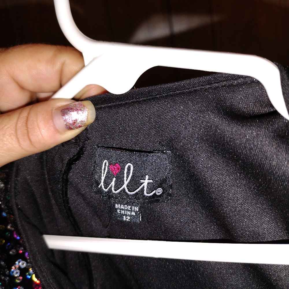 Dress size 12 kids my daughter wore once and it was too small.